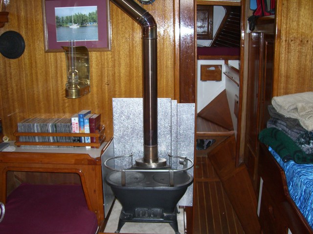 Westsail 32 gallery image with filename: westsail32-patience-interiorstove.jpg